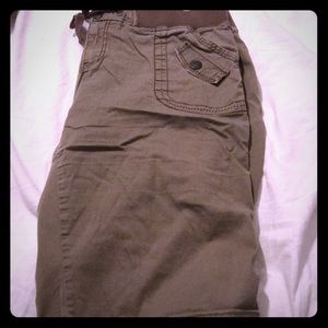 Maurice’s brown Bermuda shorts